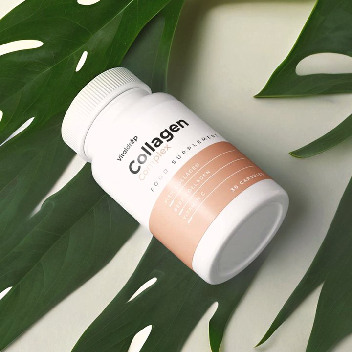 Collagen Complex Vitaldrop — butelka na liściu monstery